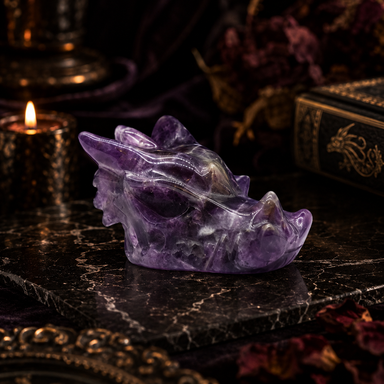 Petite tête de dragon en améthyste